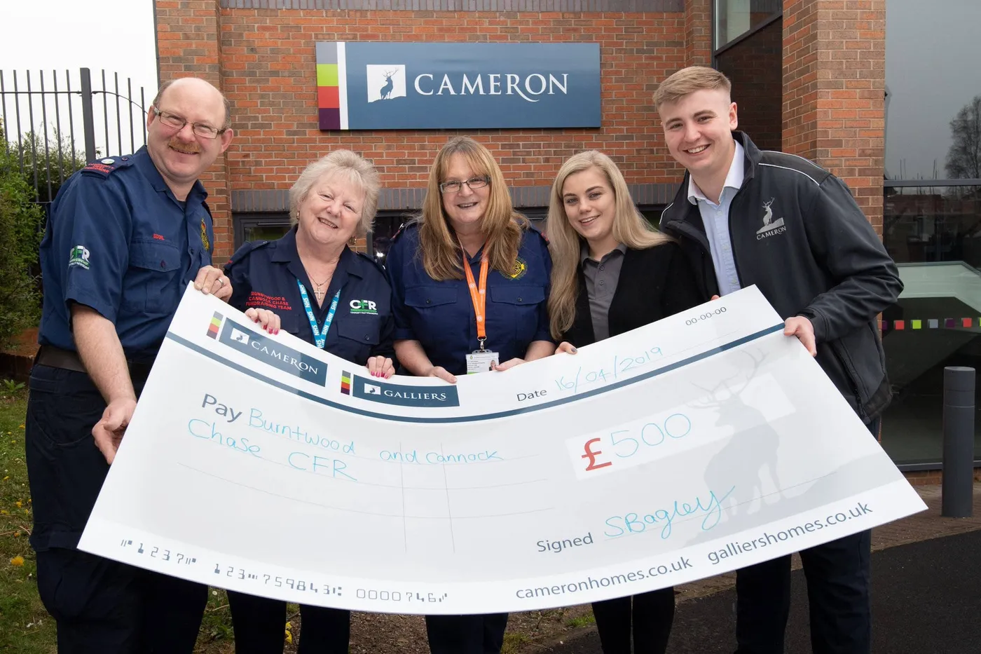 Giant fundraising cheque for Cameron Homes