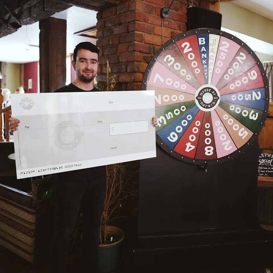 Mega cheque presentation for House of Darwin