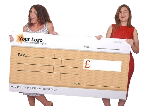 A giant cheque being presented at a charity fundraising event