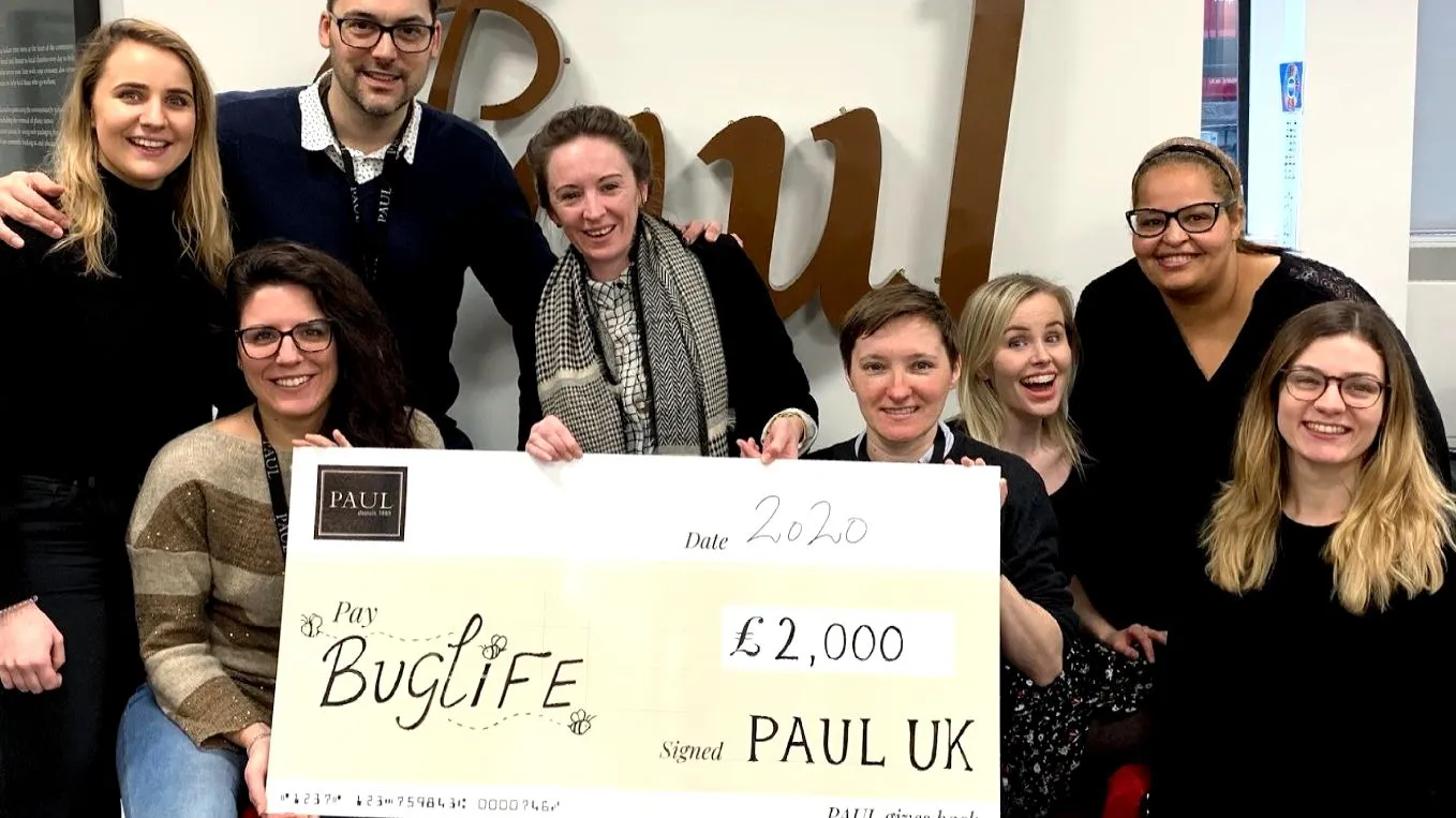 Giant charity cheque presentation for Paul Bakery