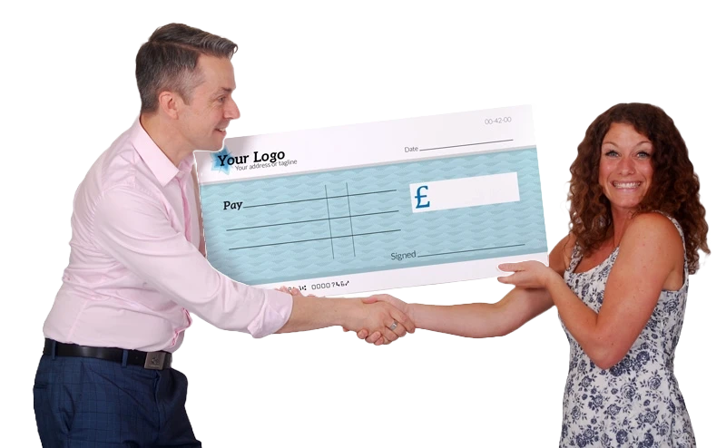 A presenter holding a giant novelty cheque at a charity event